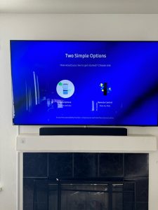 TV mounting and on-wall cable concealment above a fireplace, Palo Alto, 10/29/2024