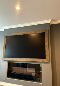Framed TV mounting above a fireplace, Union Cityy, 7/17/2021